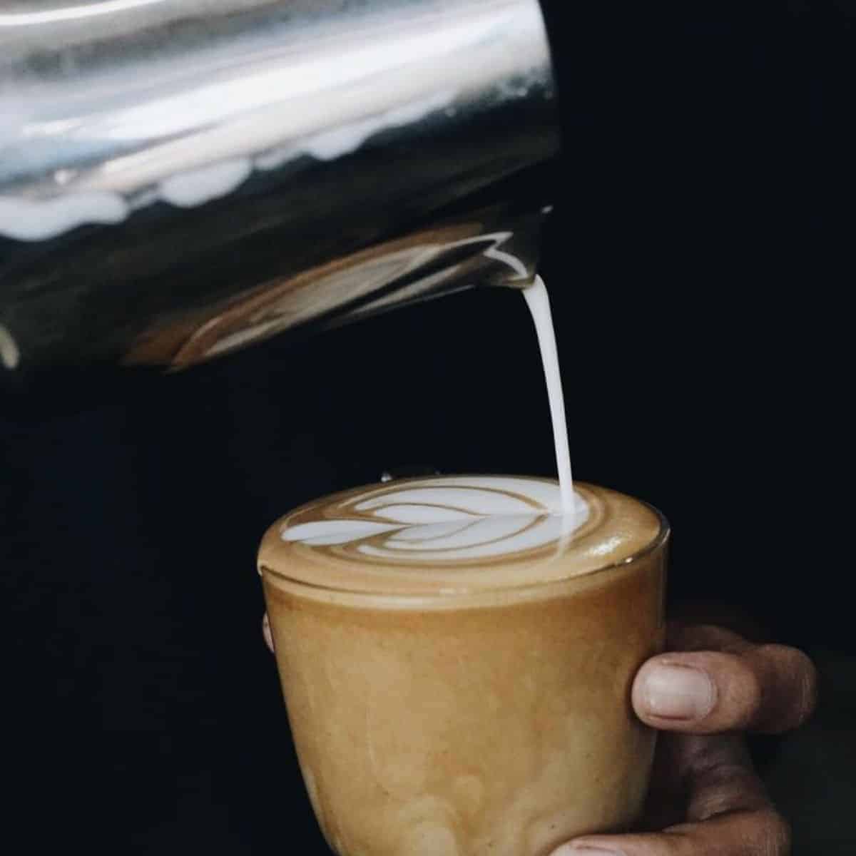 BGS coffee in a small cup with foam dripping cafes in Bali