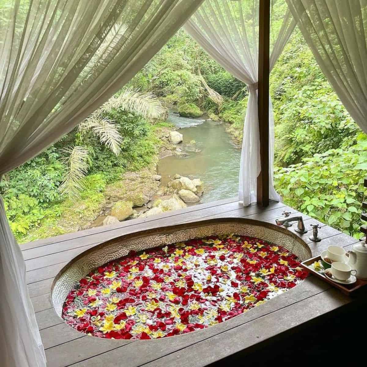 Flower bath with a wonderful view of nearby river and forest Maya spa