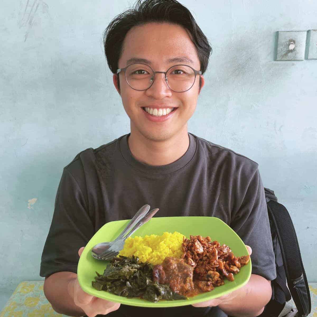 Warung Heboh nasi kuning with fried tempeh, sweet potato shoots cooked in coconut milk and beef rendang