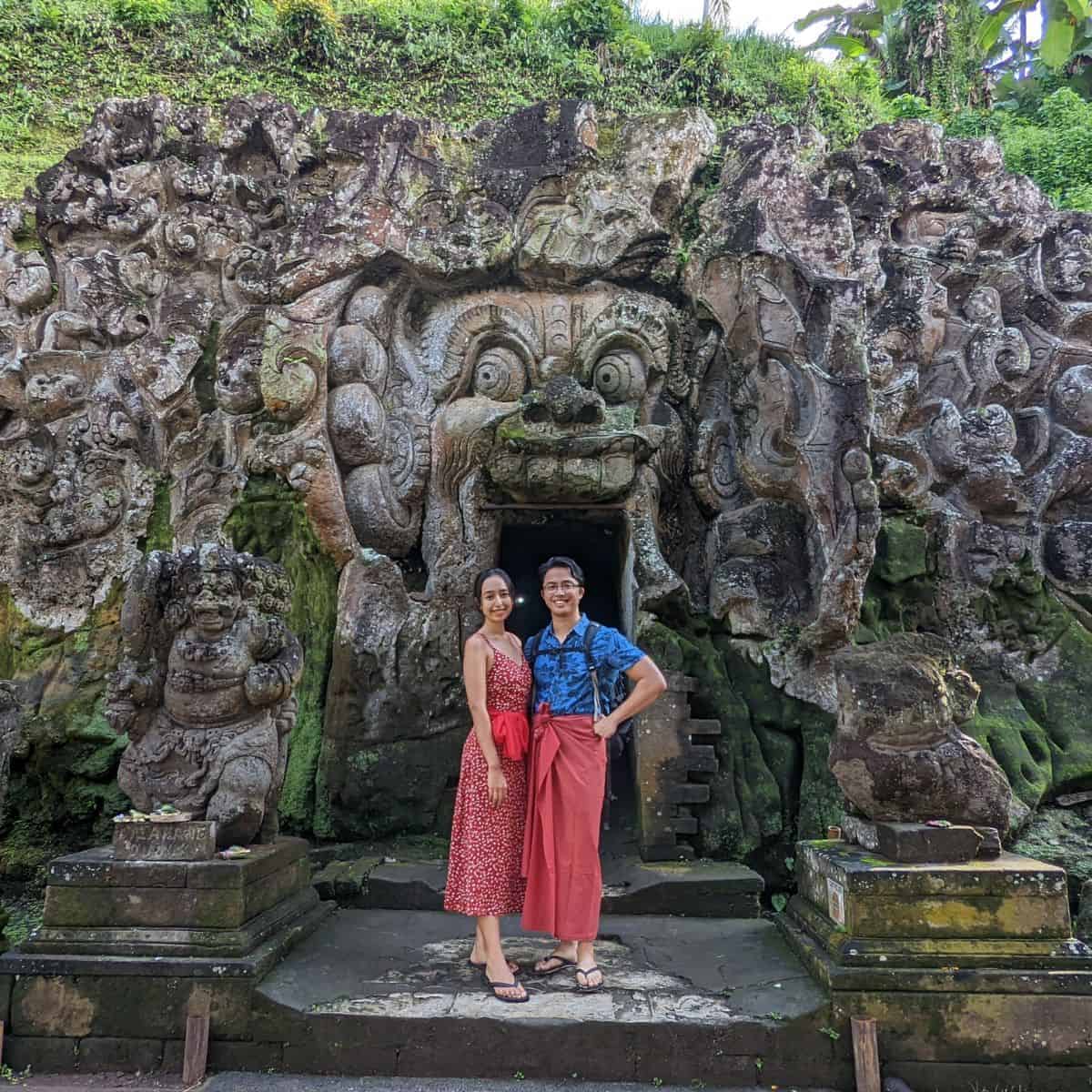 Goa Gajah at the entrance wearing sarong