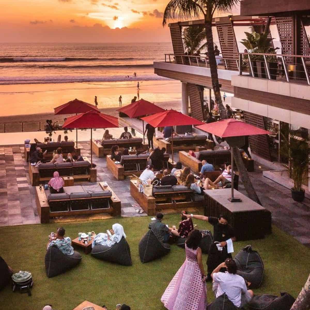 Ku De Ta crowd overview of restaurant and bar area facing the sunset