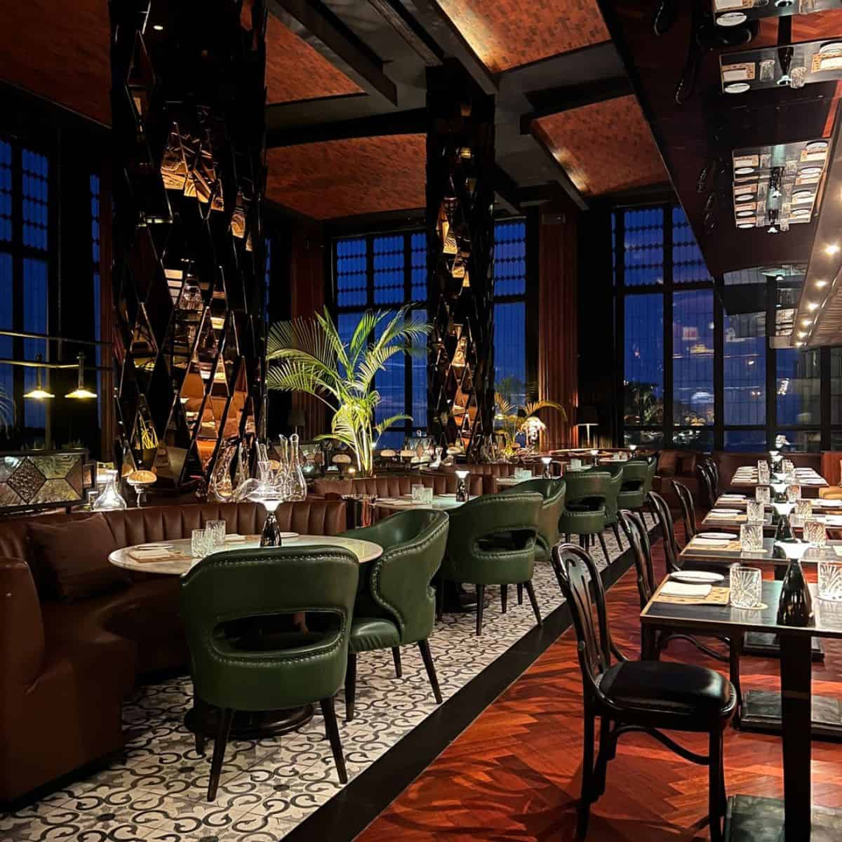 The classy fine dine interior design of The Plantation Grill in a night mode