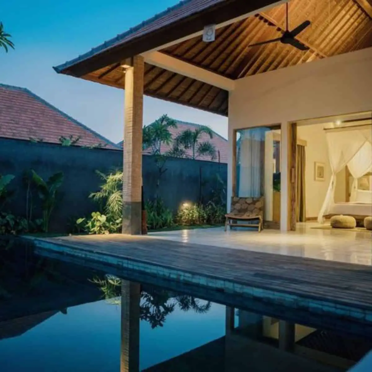 A night’s view of Purana Boutique Resort’s room with a pool best places to stay in Ubud