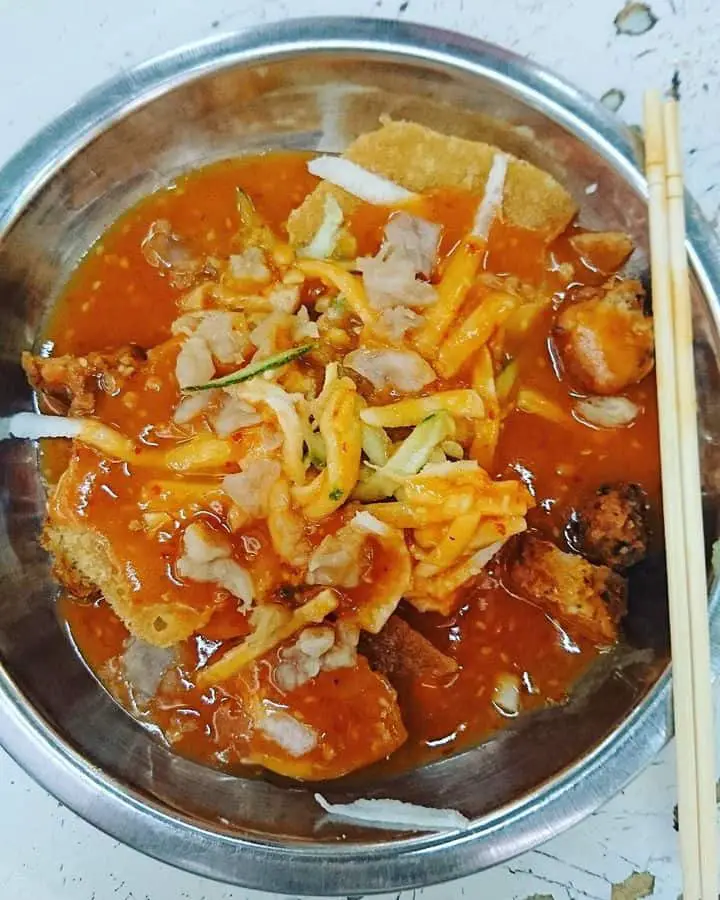 Pasembur in a bowl with a chopstick from Batu Lanchang Food Market