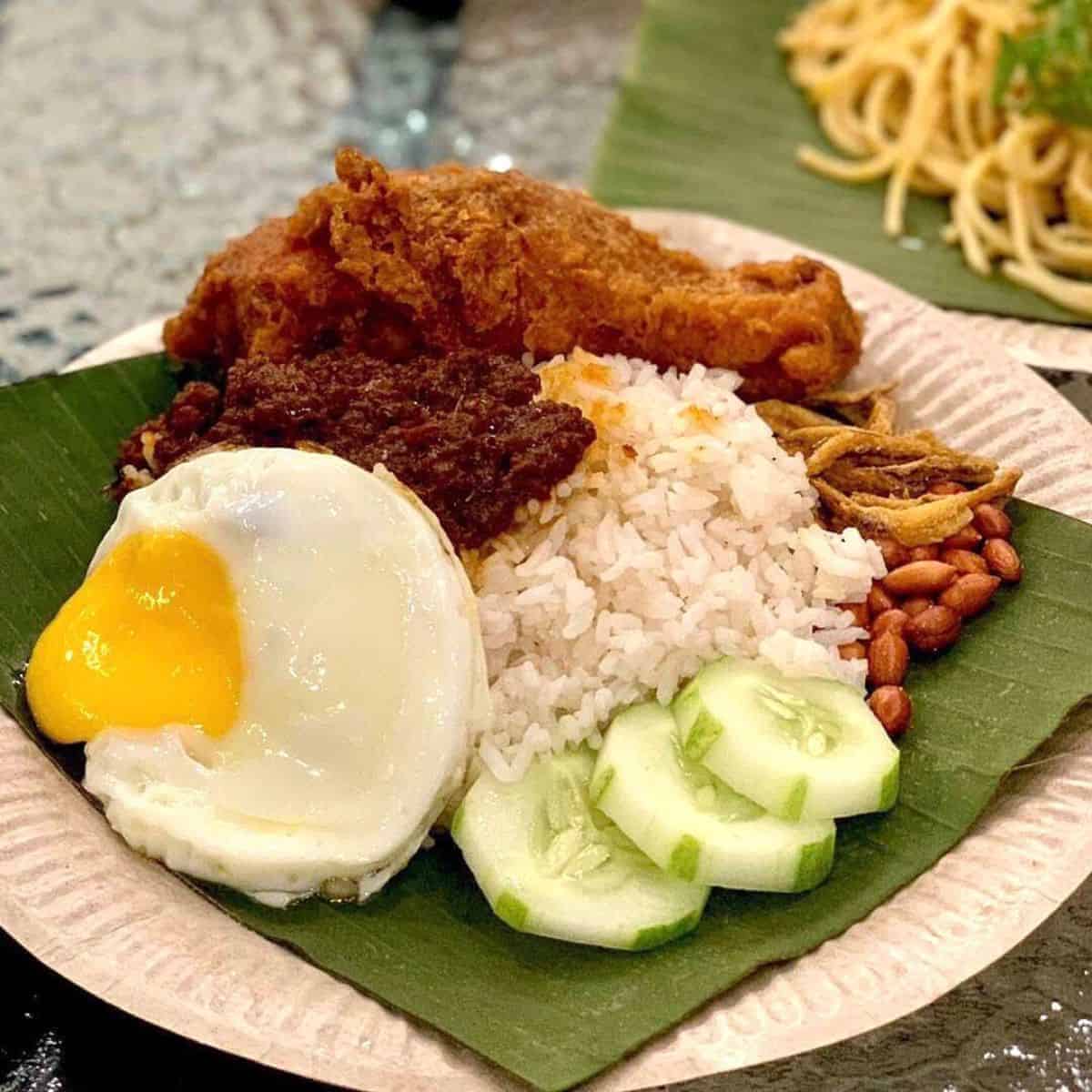 Alamak’s full plate of fatty rice with banana leaf underneath