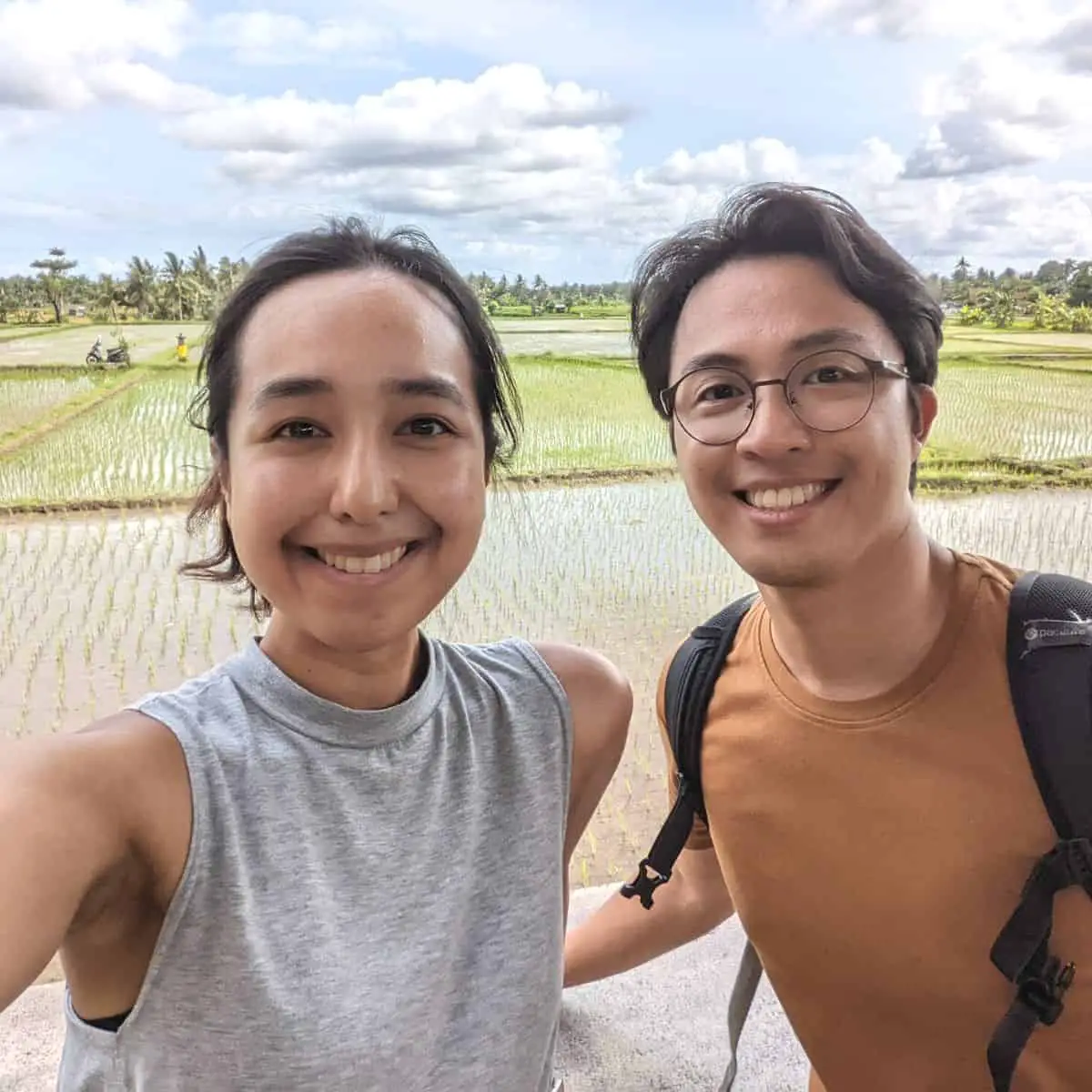 Victoria and Ruiz in front of an Ubud Rice Field near Uptodate Cafe