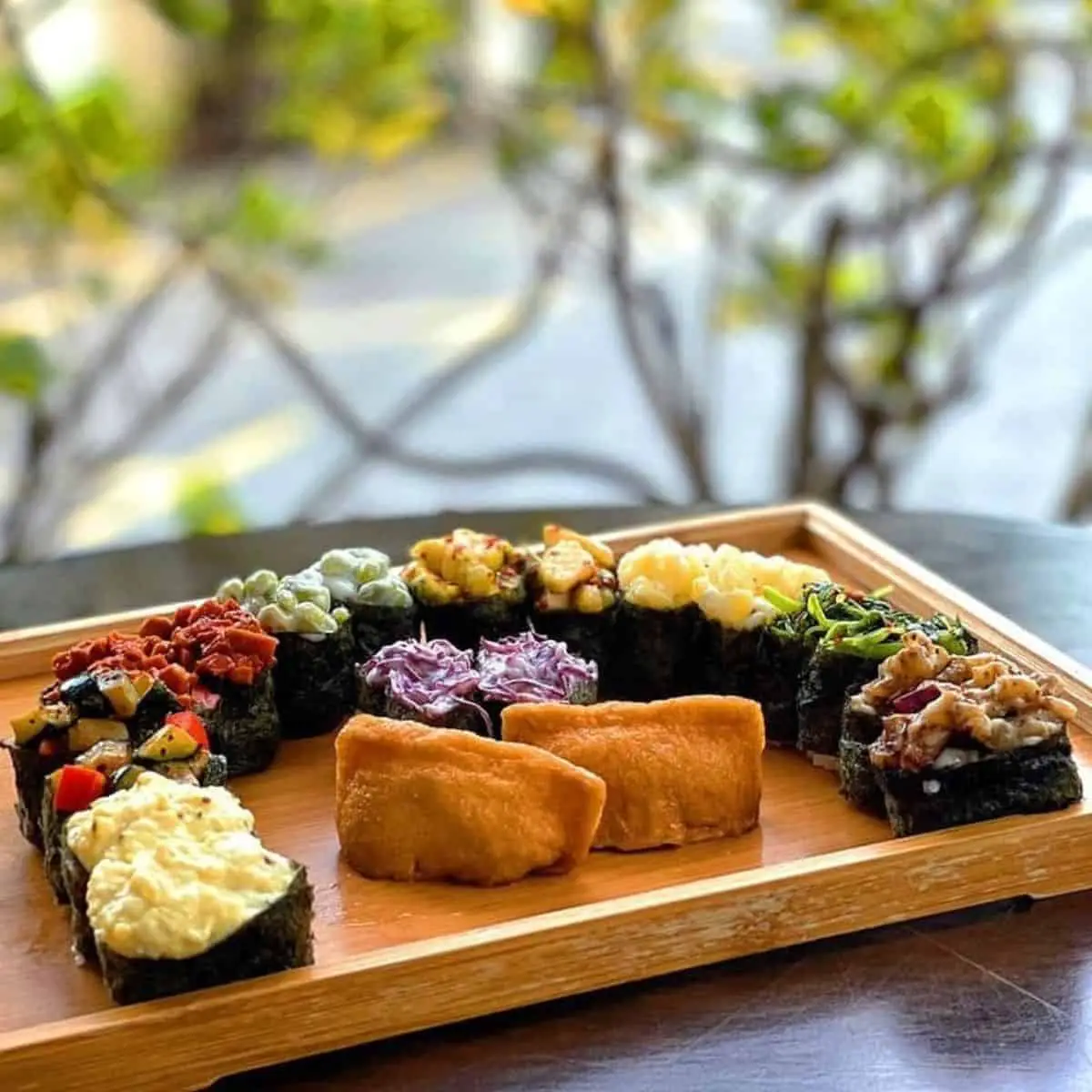 Vegetarian sushi in a wood tray from Vegie Cafe Penang