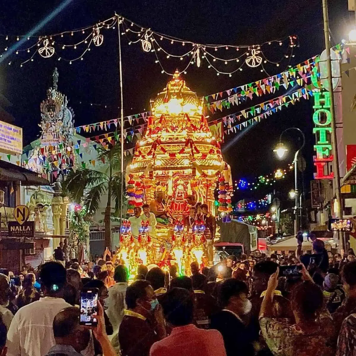 Crowds in Little India celebrating Thaipusam at night in Little India Penang