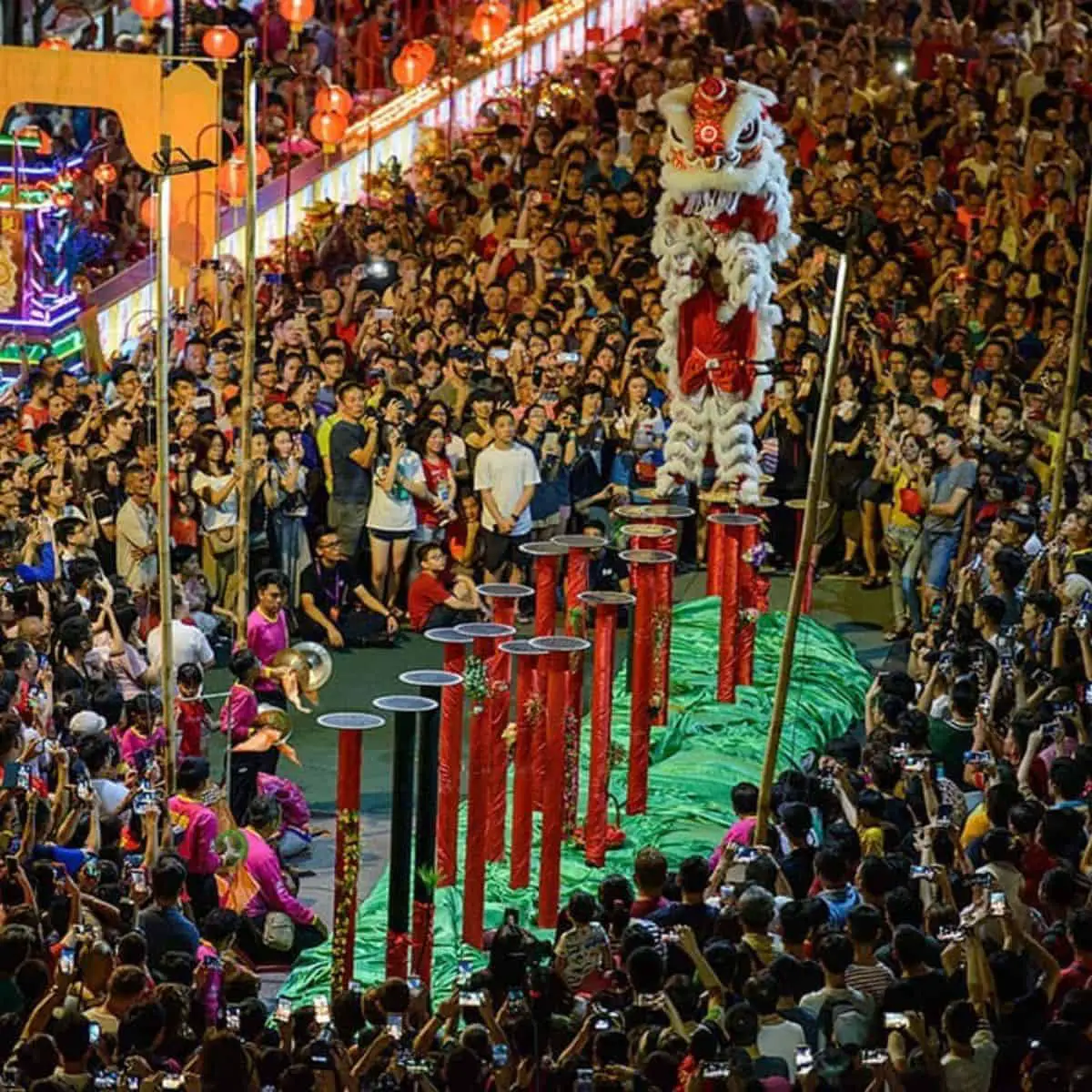 Lion dance on stilts in Penang Clan Jetties during Chinese New Year