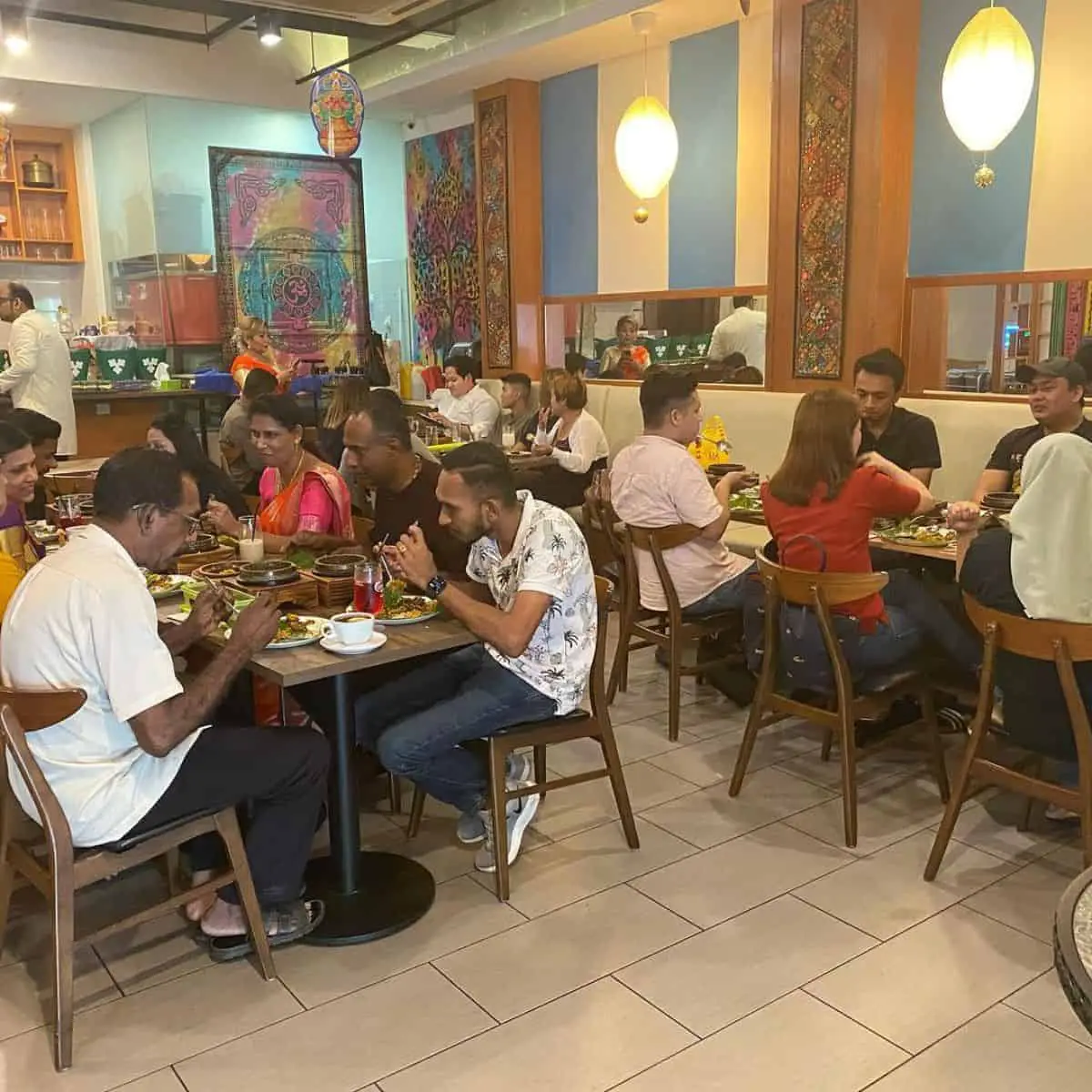Masala Hut Authentic Indian Cuisine Restaurant’s welcoming ambiance with guests enjoying their meals
