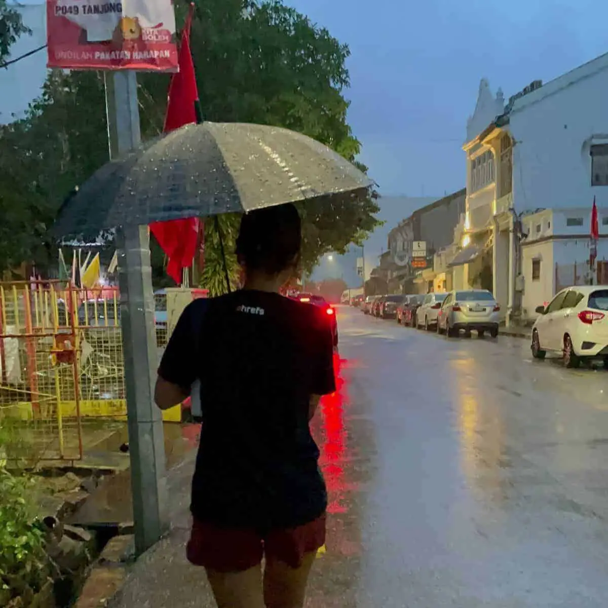 Victoria umbrella heavy rain in Penang