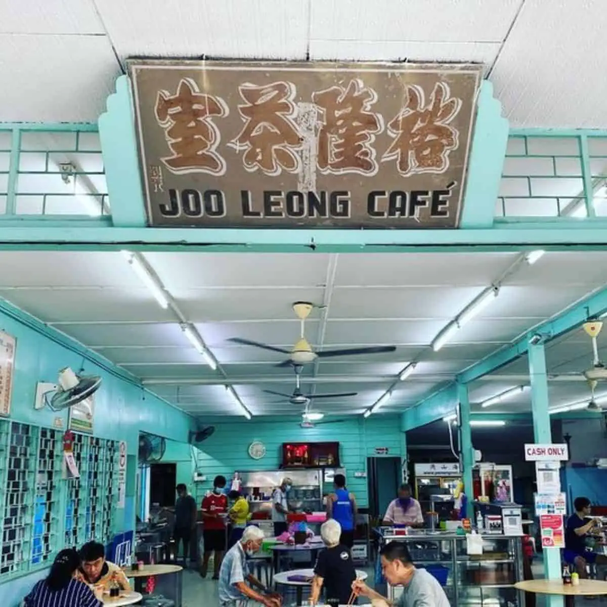 Joo Leong Kopitiam in Penang with customers enjoying their coffee and other food