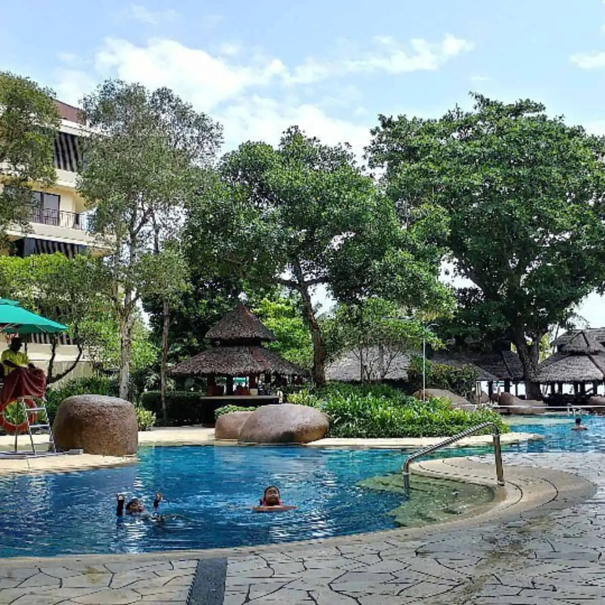 Shangri La Rasa pool area surrounded with trees