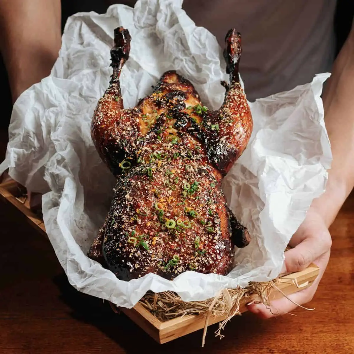 Whole roasted duck from Au Jardin with green garnishes