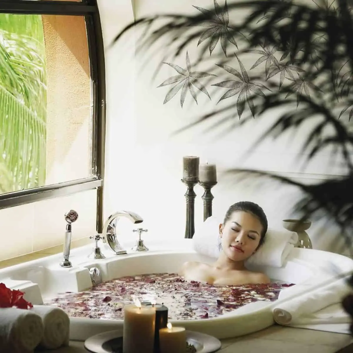 A lady soaking and enjoying her massage and spa treatment in ParkRoyal Penang Spa resort